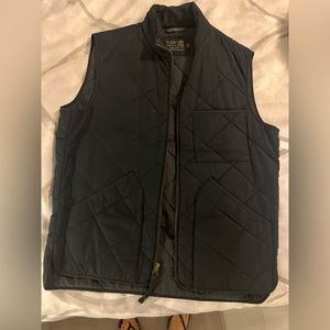 JCrew quilted black vest medium with front pockets. Excellent condition